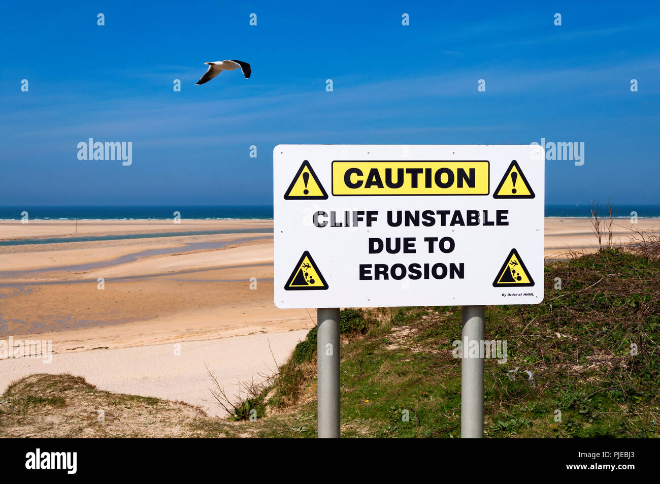 Warning Sign, Unstable Coastal Cliffs Near Hayle In Cornwall, England, Britain, Uk. Stock Photo