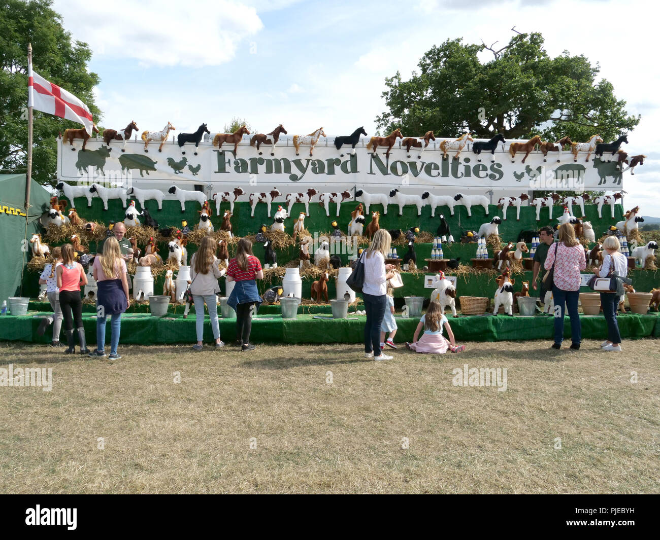 People  viewing a stall displaying all types of model animals the the Buck County Show, Buckinghamshire, UK Stock Photo