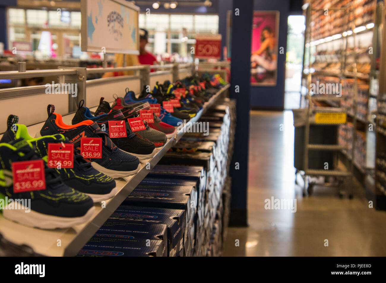 Gloucester, New Jersey - August 18, 2018: Rows of shoes for sale as seen in  a Sketcher's store on this date Stock Photo - Alamy