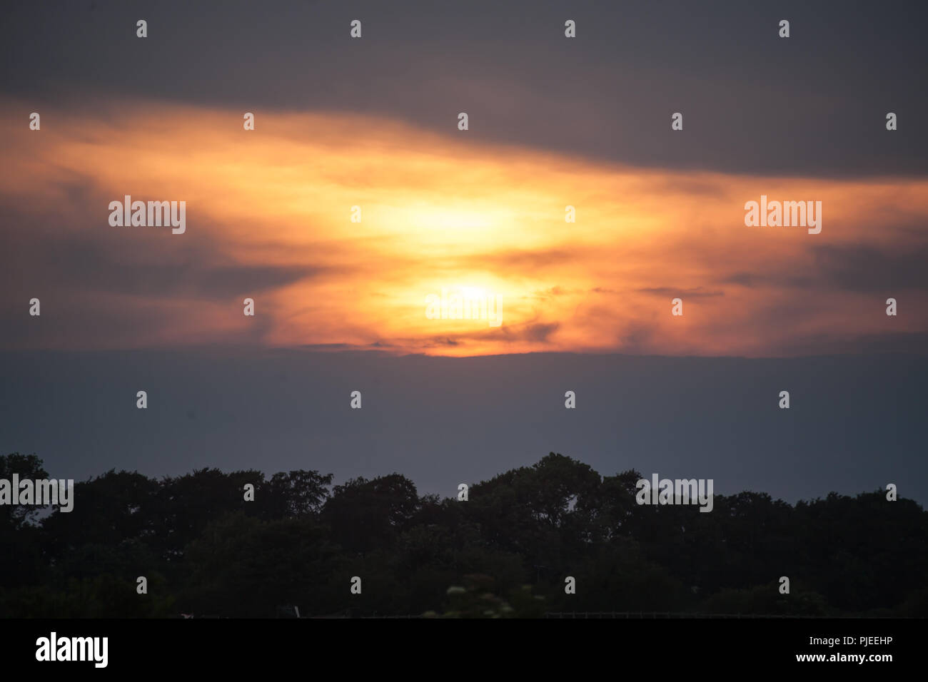 sundog over lincoln at sunset in summer Stock Photo
