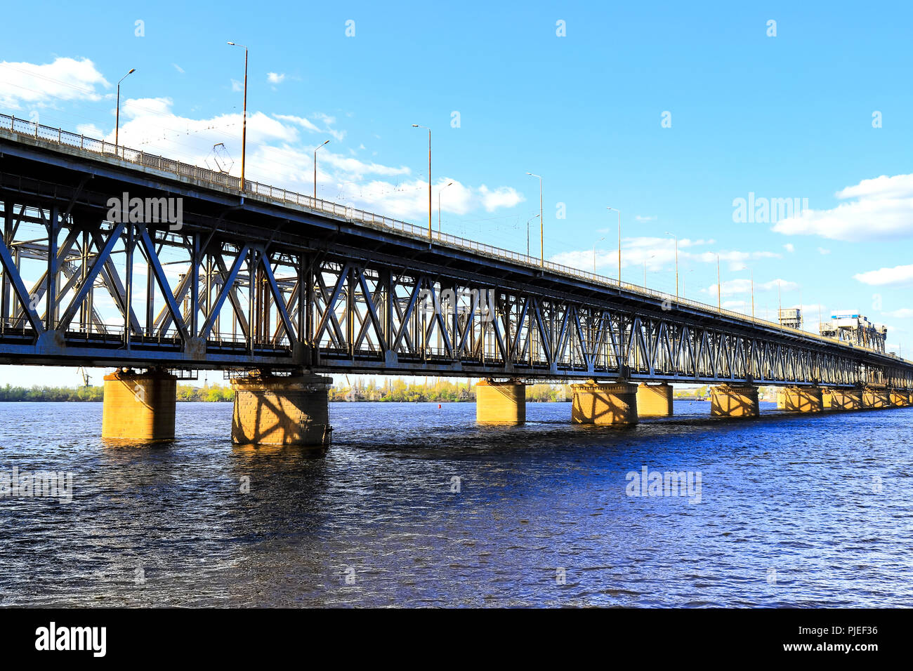 Two tiered bridge  and rail road  across the Dnieper River in Dnipro City (Dnepropetrovsk,  Dnepr), Ukraine Stock Photo