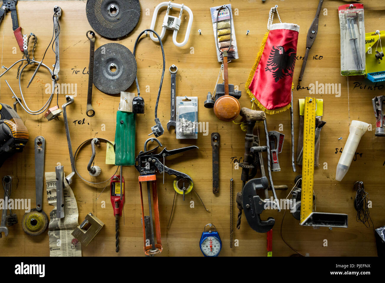 Herdi Nako, here in his workshop, has completed a professional training as a plumber in Tirana and is now responsible for the plumbing work in a skyscraper. Stock Photo