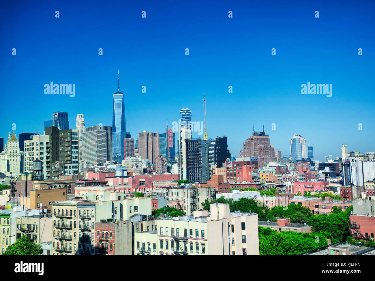 The buildings of the new york city skyline on a sunny day in the ...