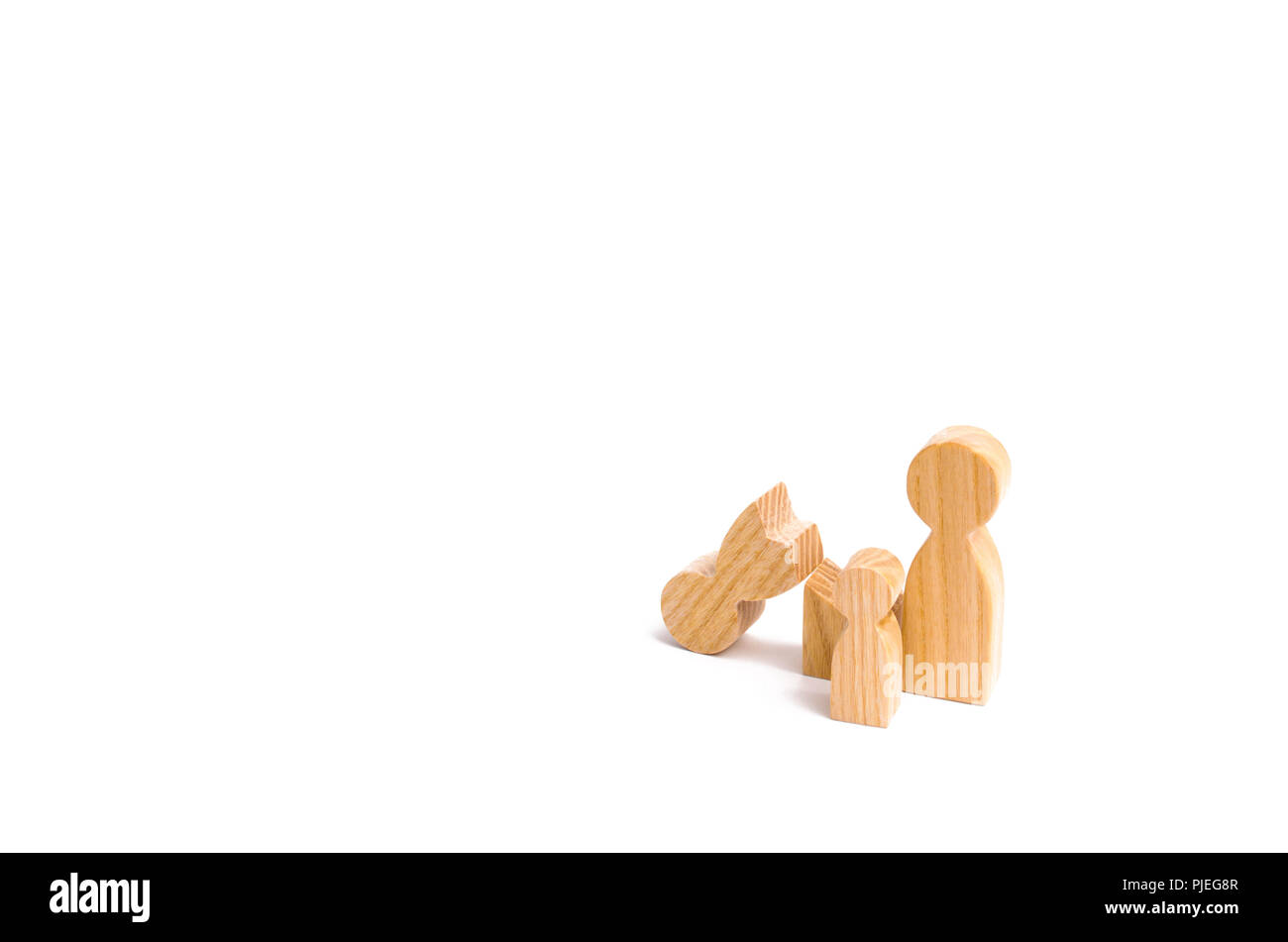 A broken wooden figure of a man with a partner and a child. Strife in the family. One parent is broken, addicted to drugs or alcohol, gaming addiction Stock Photo