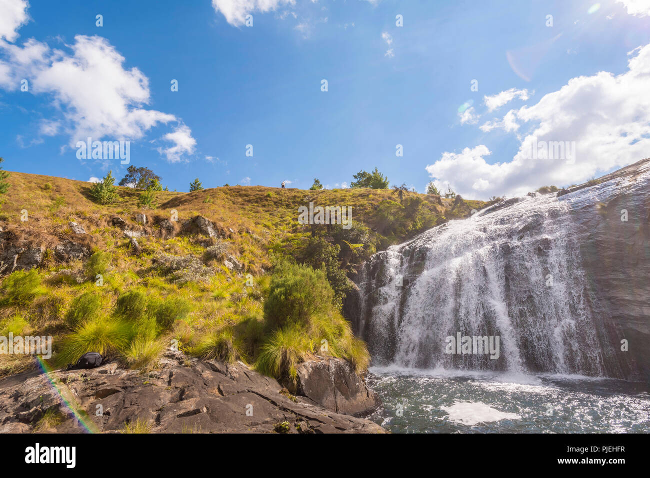 A flyfisherman fishes at Temburatedza waterfalls in Zimbabwe's Nyanga National Park. Stock Photo