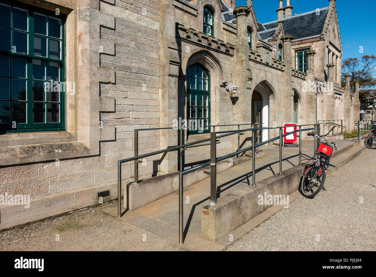 An accessibility ramp outside Garrison House, a reconstructed historic landmark in Millport, Isle of Cumbrae, which is now a multiple-use building. Stock Photo