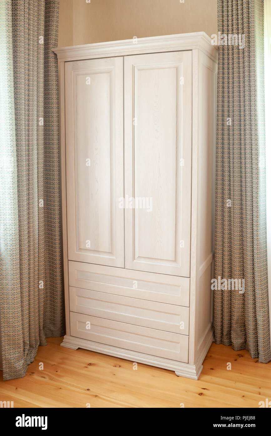 Assembling new, wooden furniture. Work of the master Stock Photo Alamy