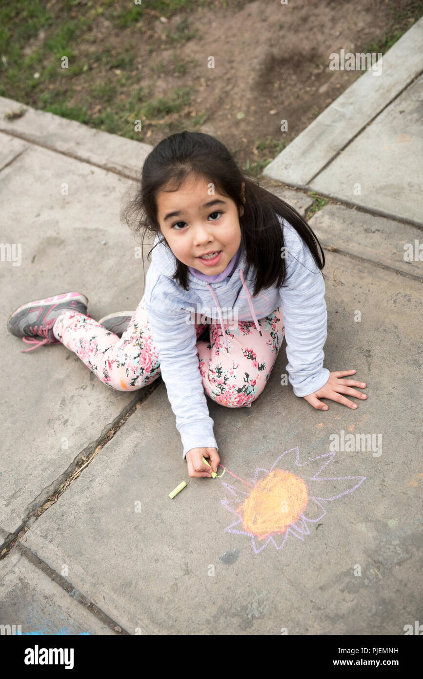 Kids Drawing with Chalk on Sidewalk Stock Photo - Alamy