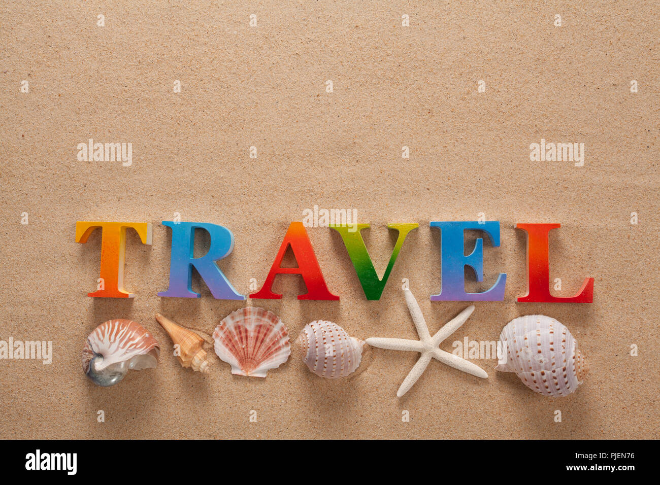 Top View Of Travel Written In Colorful Letters Decorate With