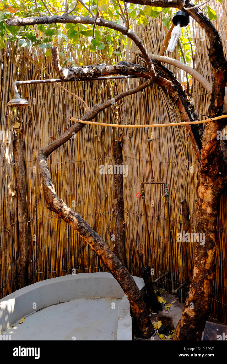 Rustic camp shower and ablution facilities in a game reserve in Botswana Stock Photo