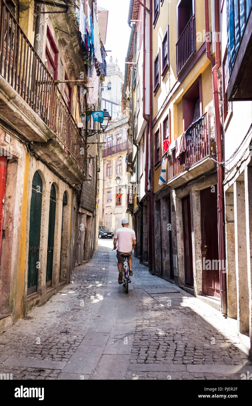 Cycling down Rua Afonso Martins Alho, Porto, Portugal. Stock Photo
