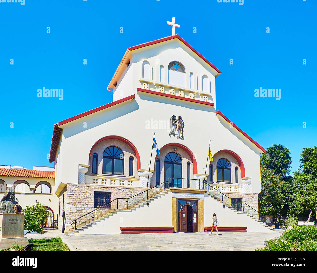 Kos, Greece - July 3, 2018. Principal facade of The Church of Evangelismos, Kos Town Cathedral. View from Vasileos Georgiou street. South Aegean. Stock Photo