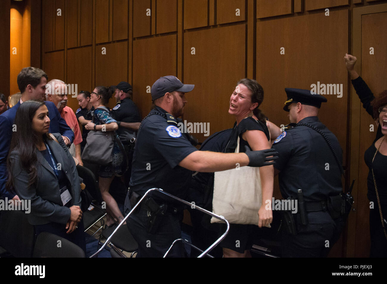 Washington, District of Columbia, USA. 6th Sep, 2018. Protestors disrupt U.S. Supreme Court nominee Judge Brett Kavanaugh's confirmation hearing on Capitol Hill. Kavanaugh was nominated by U.S. President Donald Trump to fill the vacancy on the court left by retiring Justice Anthony Kennedy. Credit: Erin Scott/ZUMA Wire/Alamy Live News Stock Photo