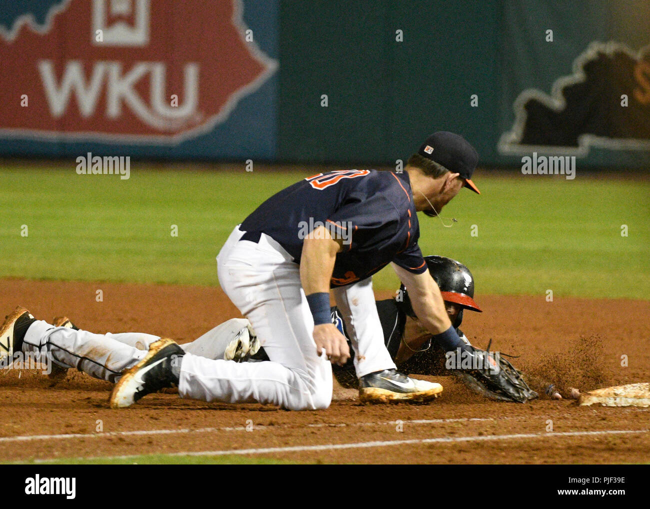 The Second Round. 6th Sep, 2018. USA Bowling Green Hot Rods first baseman Jim Haley (20) tags Lansing Lugnuts center fielder Reggie Pruitt (5) as retries to get back after being picked off during a Mid West League series between the Lansing Lugnuts and the Bowling Green Hot Rods in Bowling Green, KY st Bowling Green Ballpark. Hot Rods sweep Lugnuts and advance to the second round. (Mandatory Photo Credit: Steve Roberts/CSM) Credit: csm/Alamy Live News Stock Photo