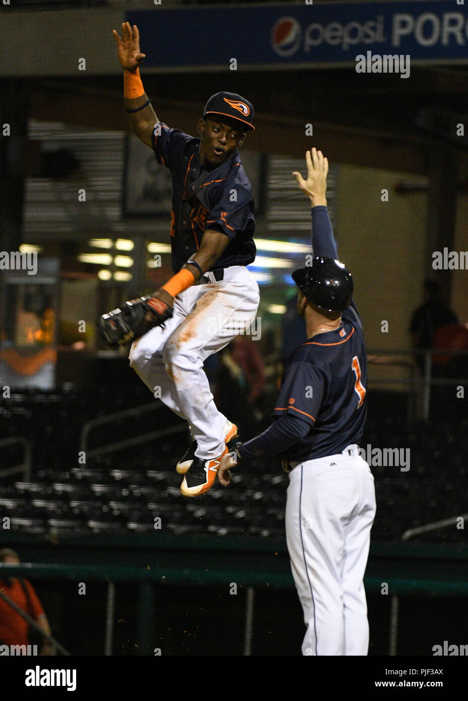 September 6, 2018; Bowling Green KY, USA Bowling Green Hot Rods second baseman Vidal Brujan (2) gives Bowling Green Hot Rods manager Craig Albernaz (1) a high five after the victory during a Mid West League series between the Lansing Lugnuts and the Bowling Green Hot Rods in Bowling Green, KY st Bowling Green Ballpark. Hot Rods sweep Lugnuts and advance t round two. (Mandatory Photo Credit: Steve Roberts/CSM) Stock Photo