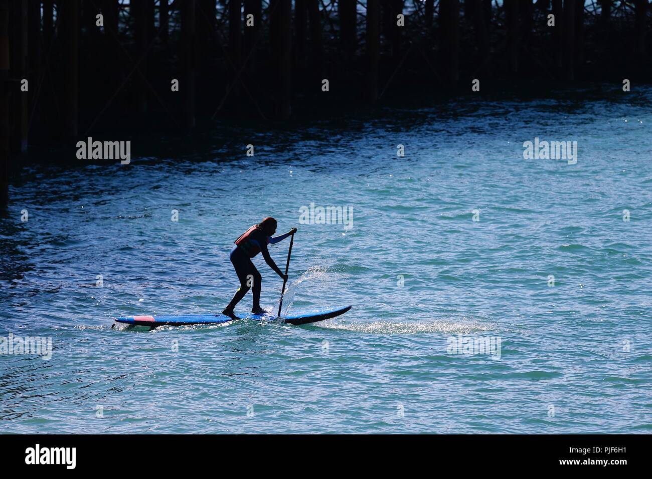 Woman paddle boarding uk hires stock photography and images Alamy