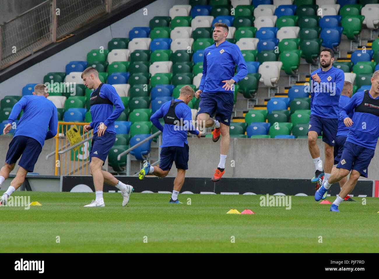Windsor Park, Belfast, Northern Ireland. 07 September 2018. Northern Ireland in training this morning at Windsor Park before tomorrow night's UEFA Nations League at the stadium against Bosnia & Herzegovina. Kyle Lafferty jumps in training. Credit: David Hunter/Alamy Live News. Stock Photo