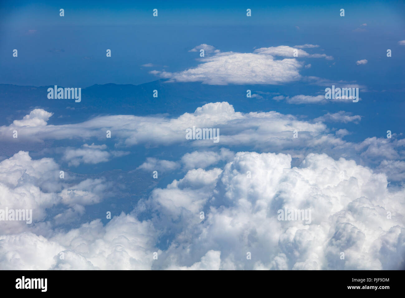 Fluffy clouds hanging over hi-res stock photography and images - Alamy