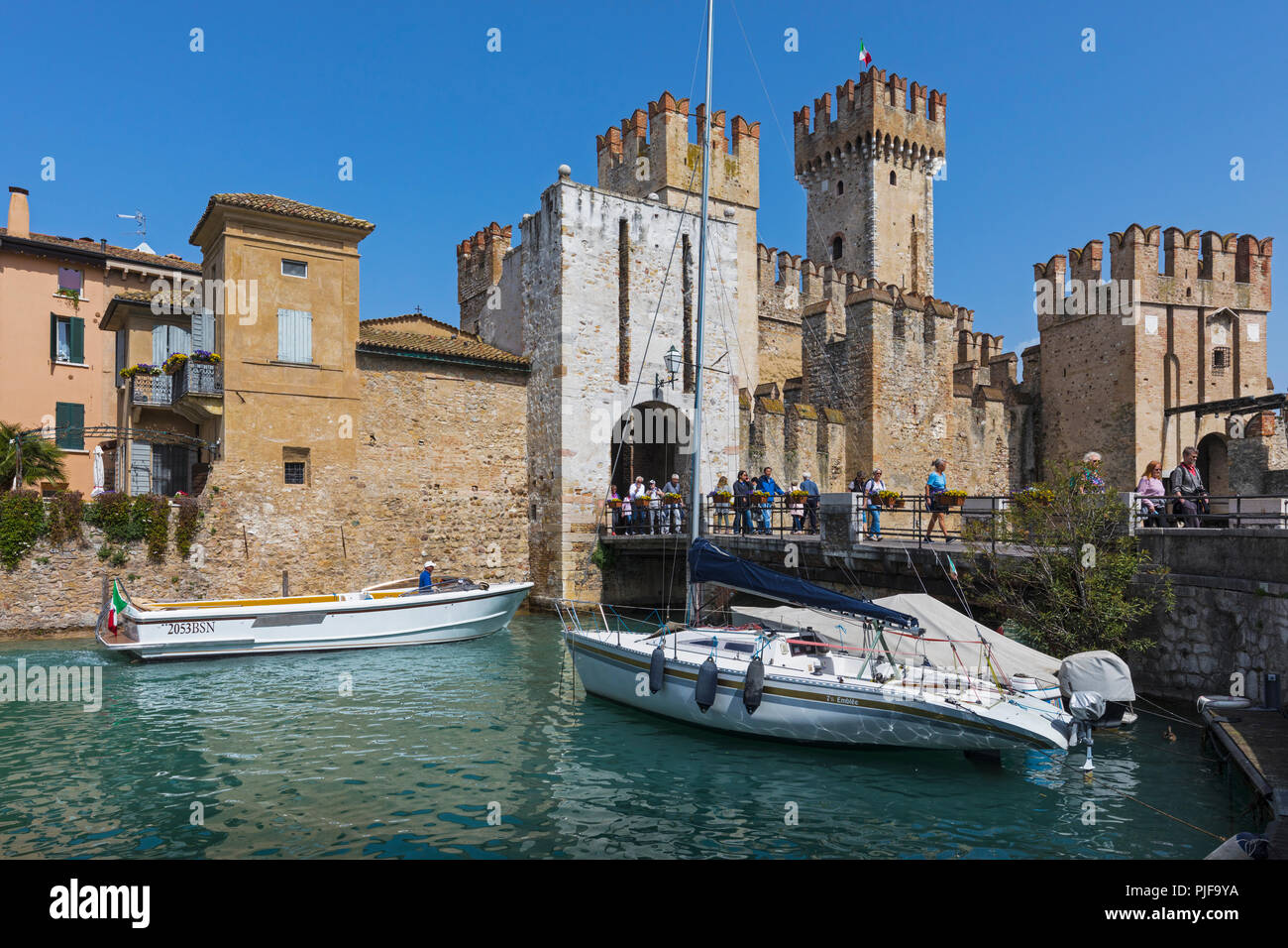 Sirmione, Brescia Province, Lombardy, Italy. The Scaligero Castle.  Building of the original castle began in the 13th century.  It is described as bei Stock Photo