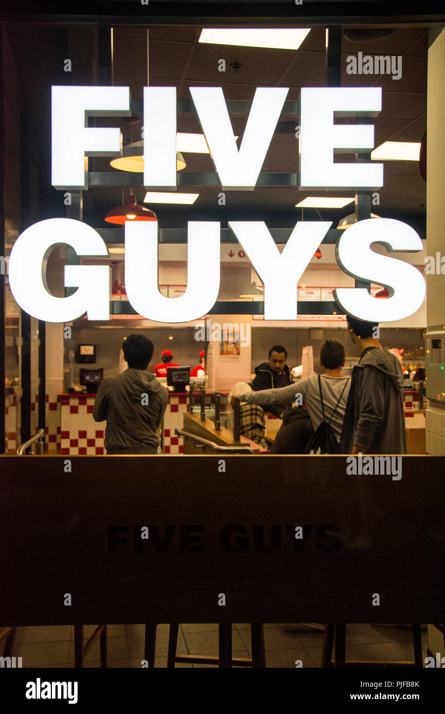 Five Guys Fast-food chain on Coventry Street, Piccadilly, London, UK Stock Photo