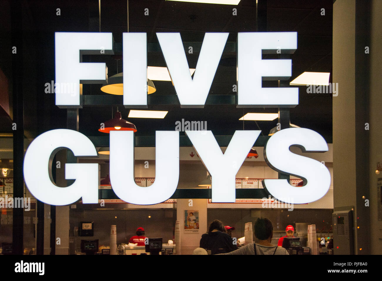 Five Guys Fast-food chain on Coventry Street, Piccadilly, London, UK Stock Photo