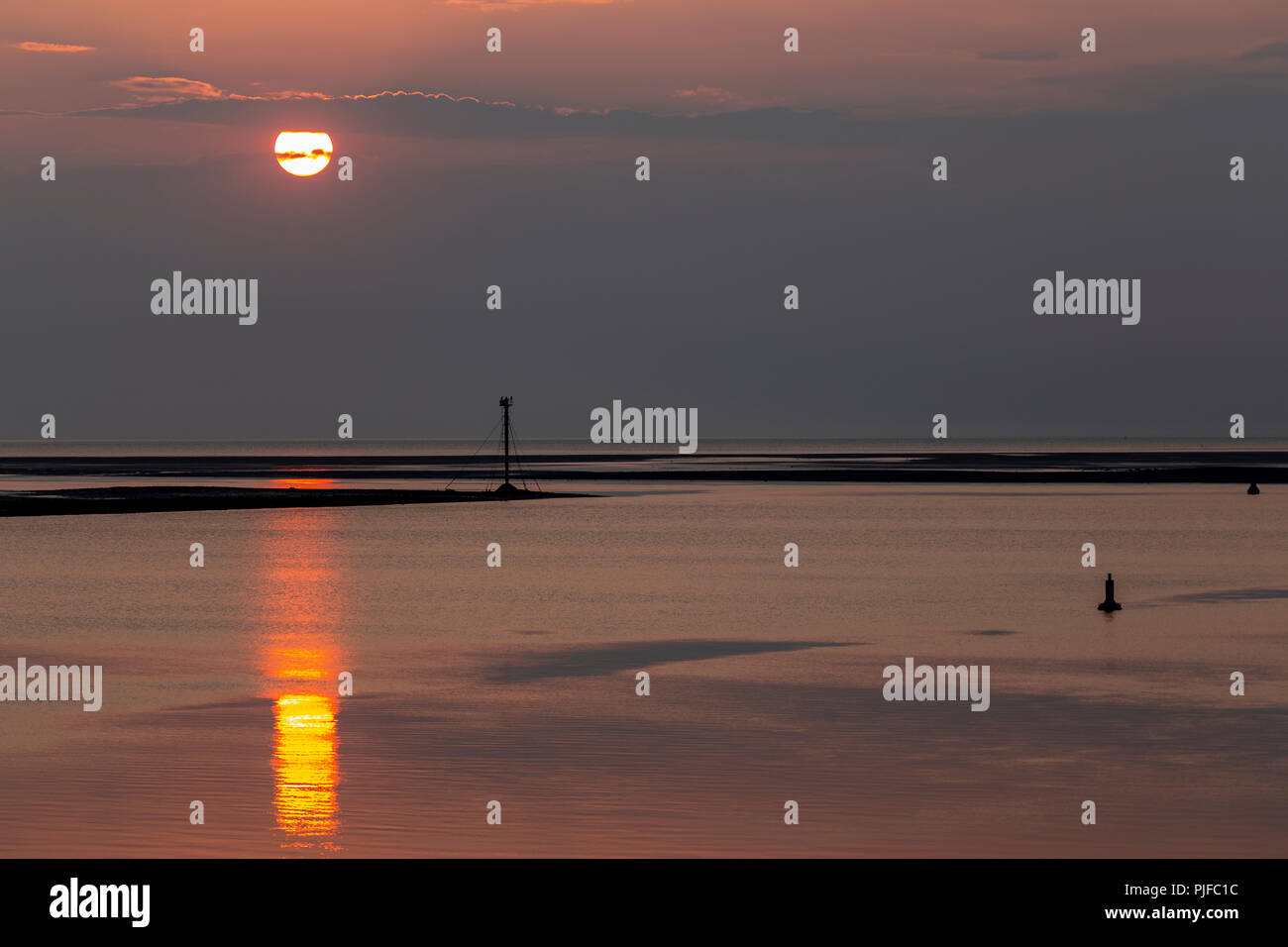 Sunset over the Irish Sea from Deganwy on the North Wales coast Stock Photo