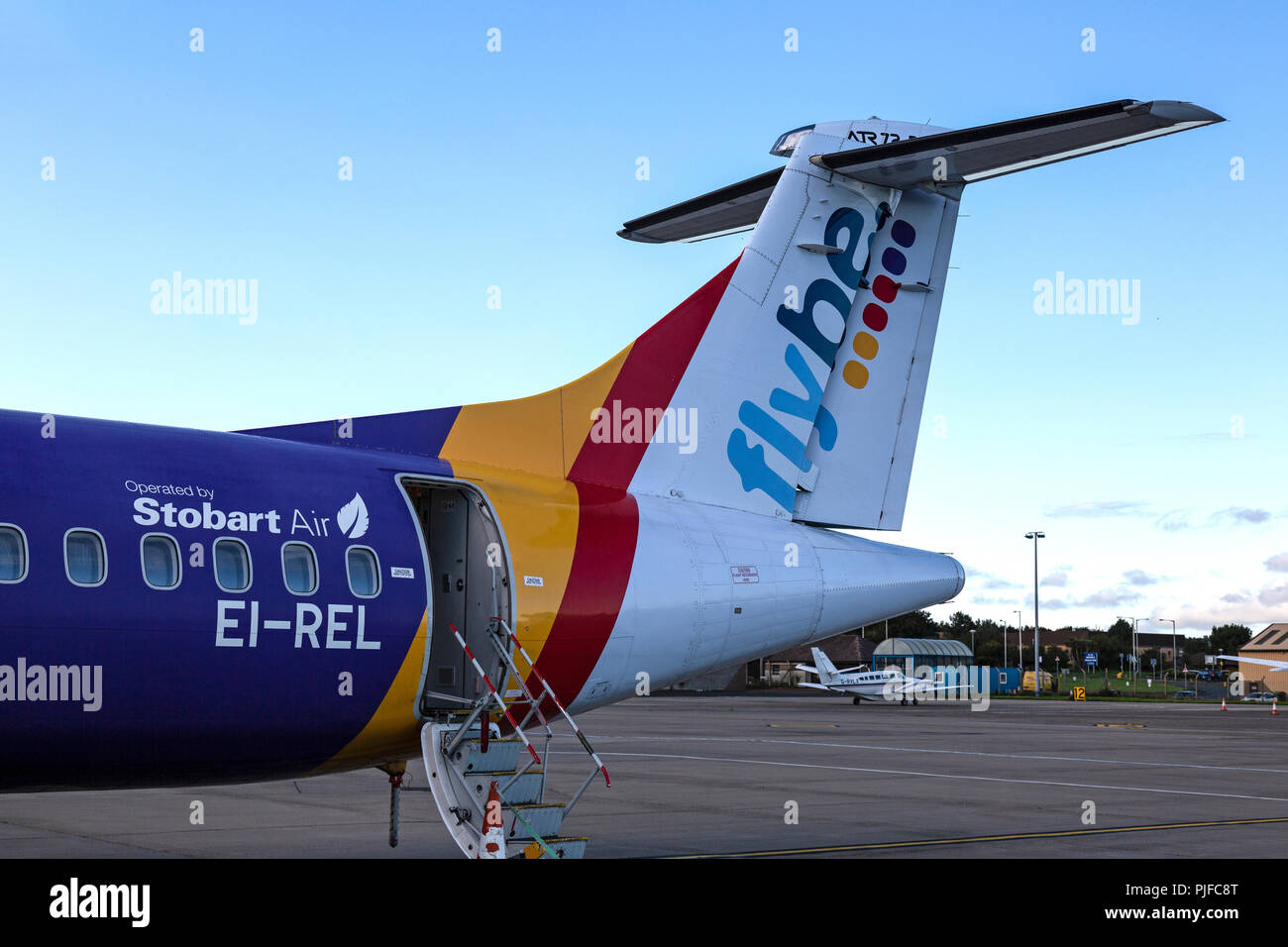 The tail of an ATR-72 aeroplane owned by the British Airline, Flybe, and operated by Stobart Air. Photograph taken at Ronaldsway Airport, Isle Of Man. Stock Photo