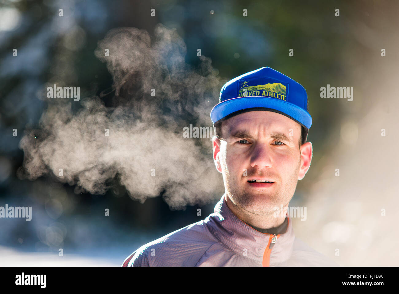 Portrait of a man in a cold winter morning Stock Photo