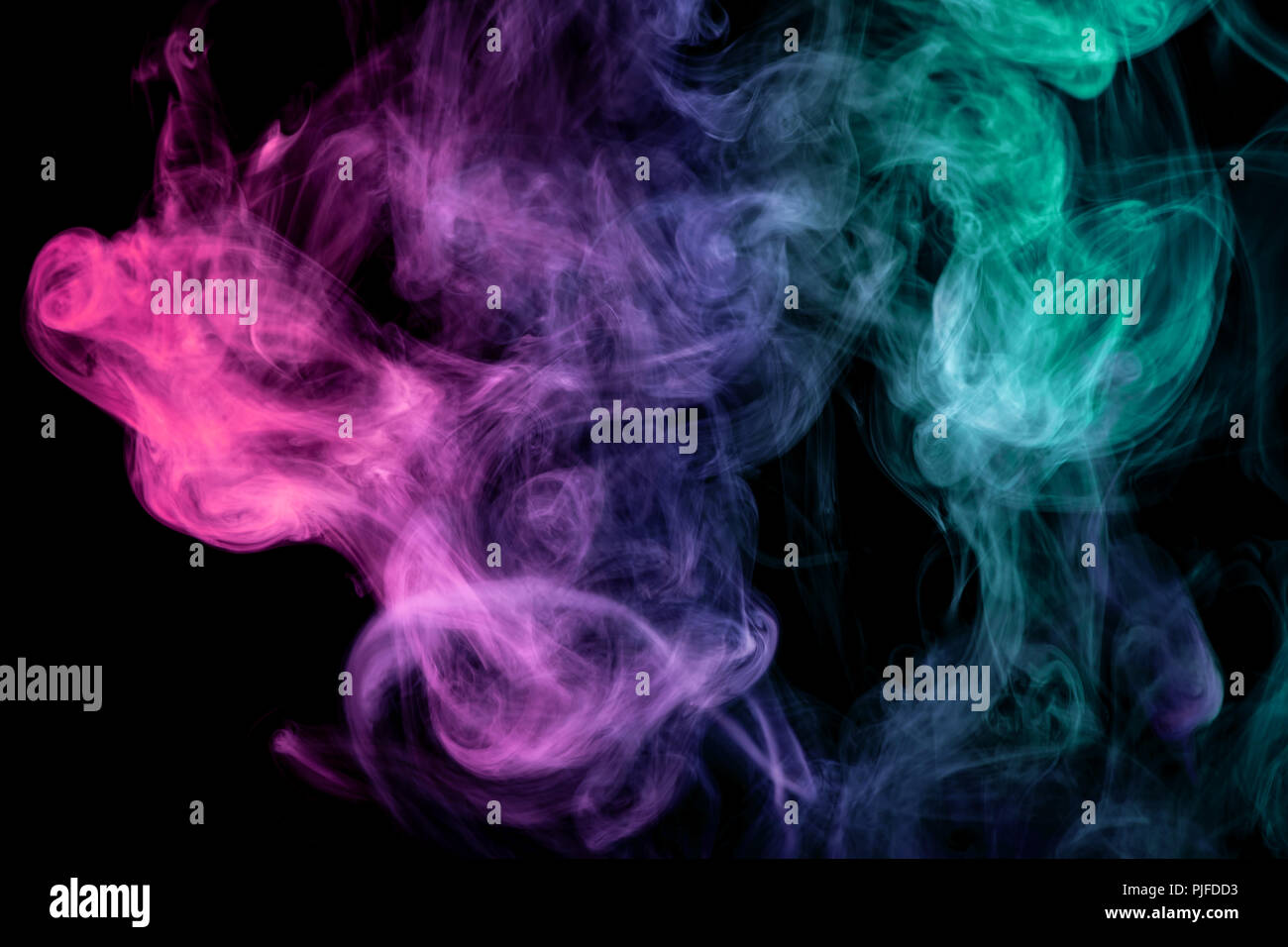 Pink, green and blue cloud smoke on black isolated background Stock ...