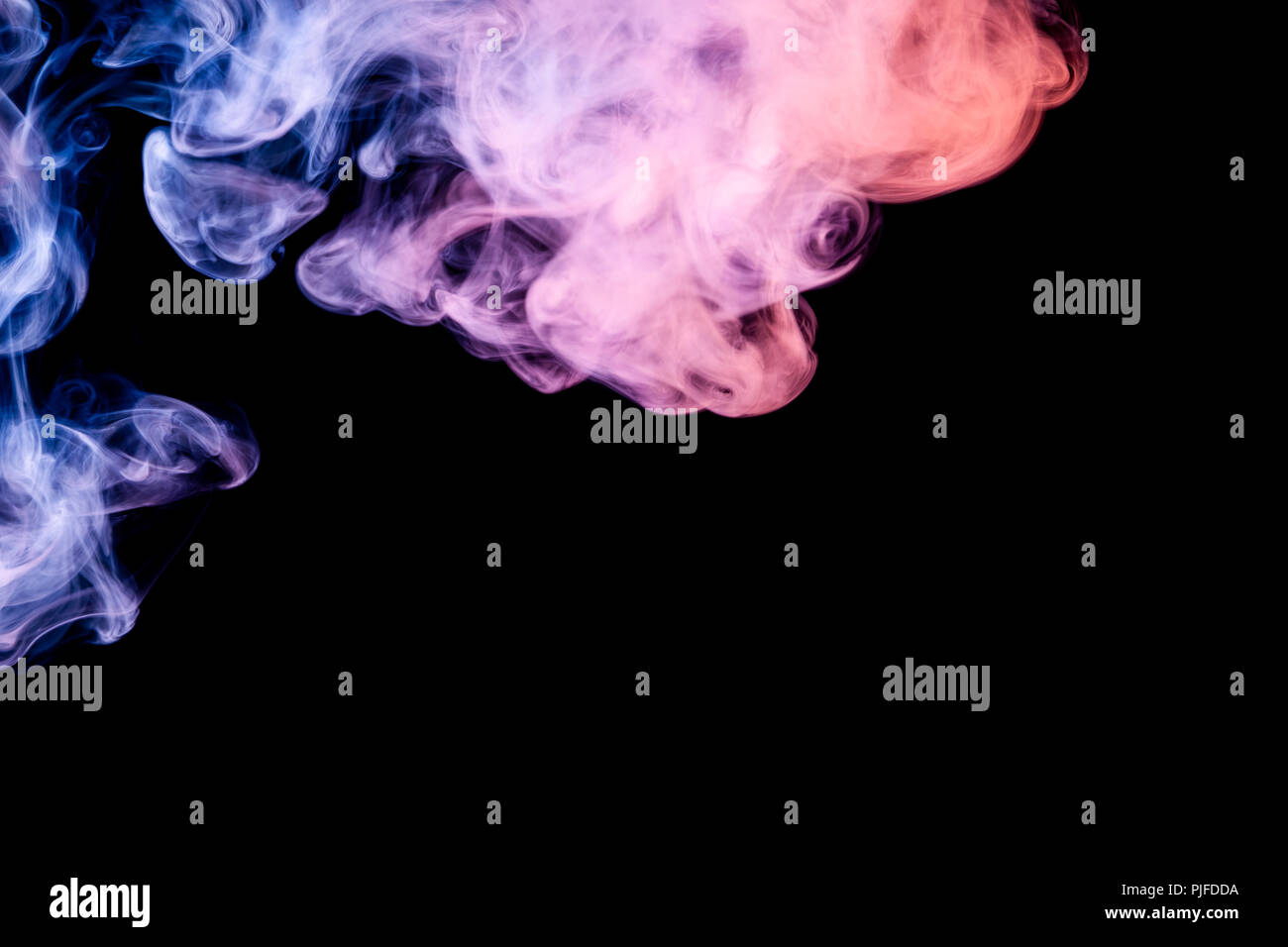 Pink, green and blue cloud smoke on black isolated background Stock ...