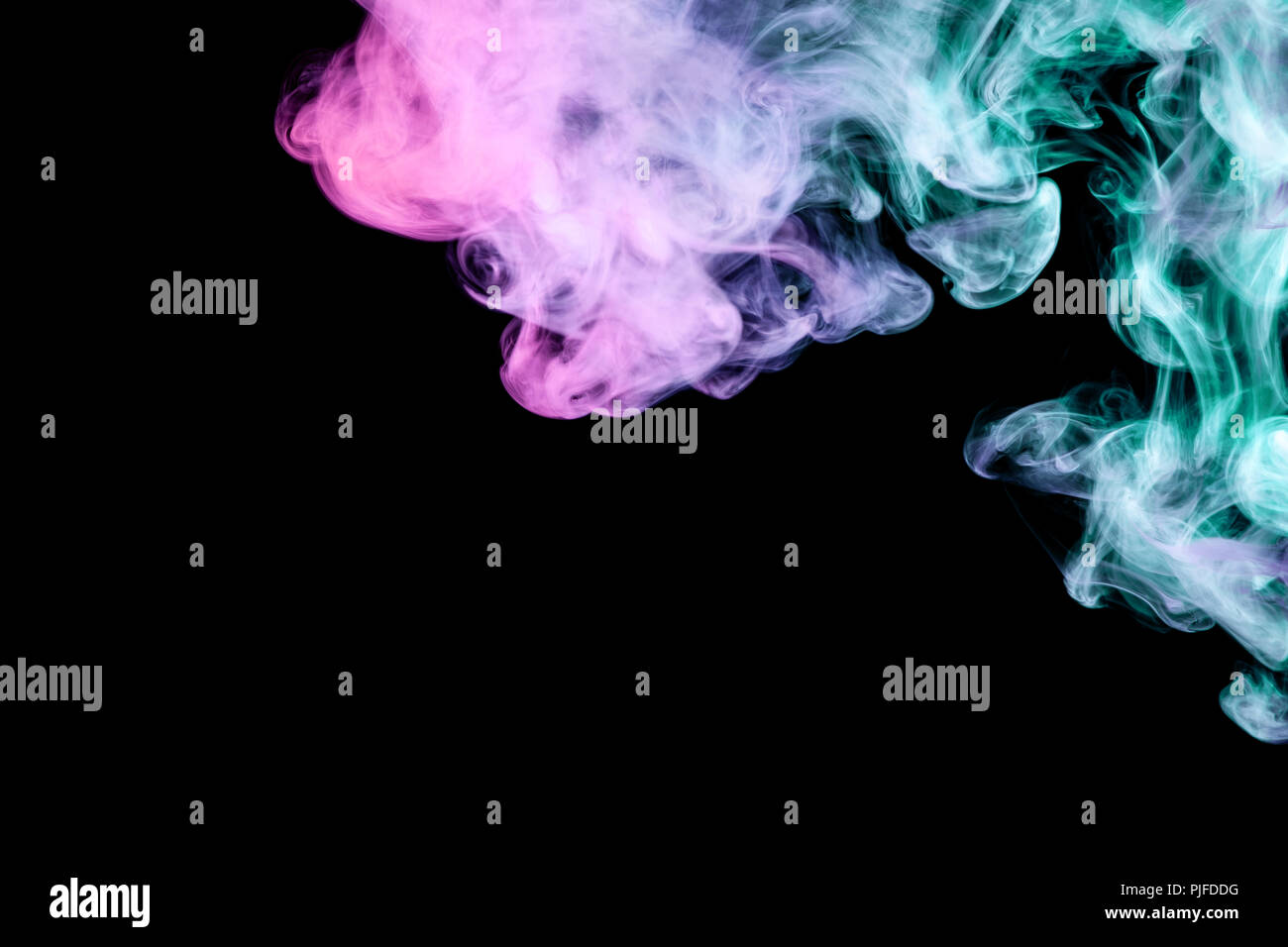 Pink, green and blue cloud smoke on black isolated background Stock ...