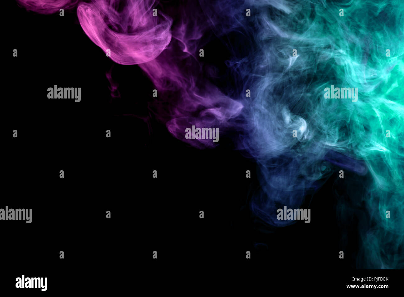 Pink, green and blue cloud smoke on black isolated background Stock ...