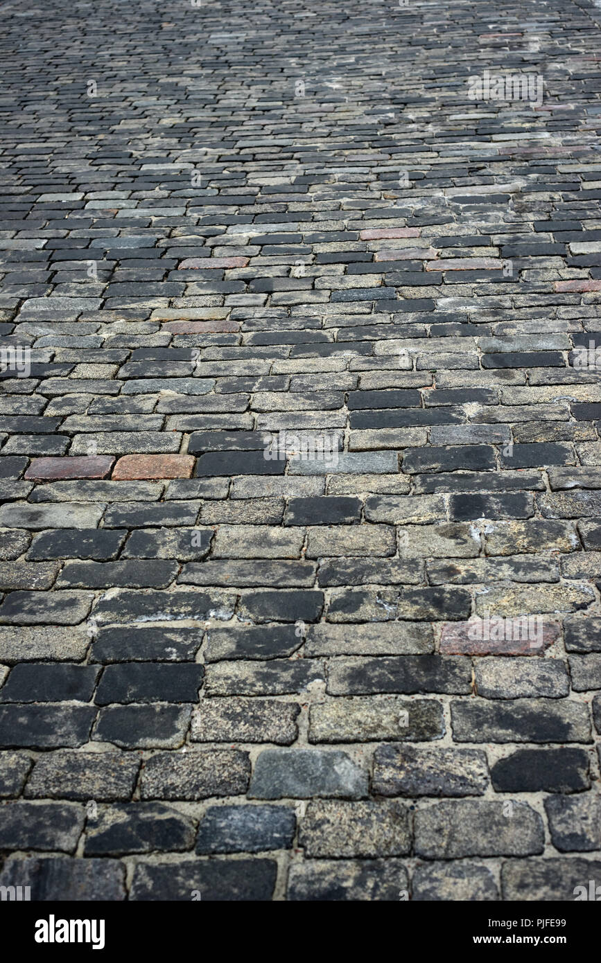 old cobblestone road for background or texture Stock Photo - Alamy