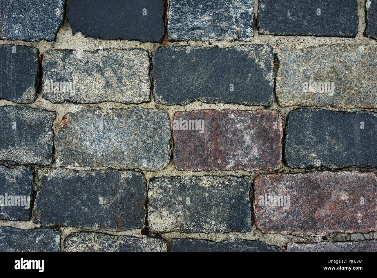 old cobblestone road for background or texture Stock Photo - Alamy