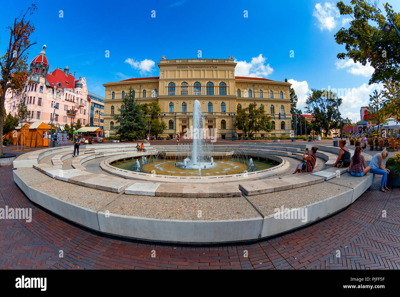 Dugonics square in the center of Szeged with University building on the right,and the Ungar-Mayer secession style palace on the left. Stock Photo