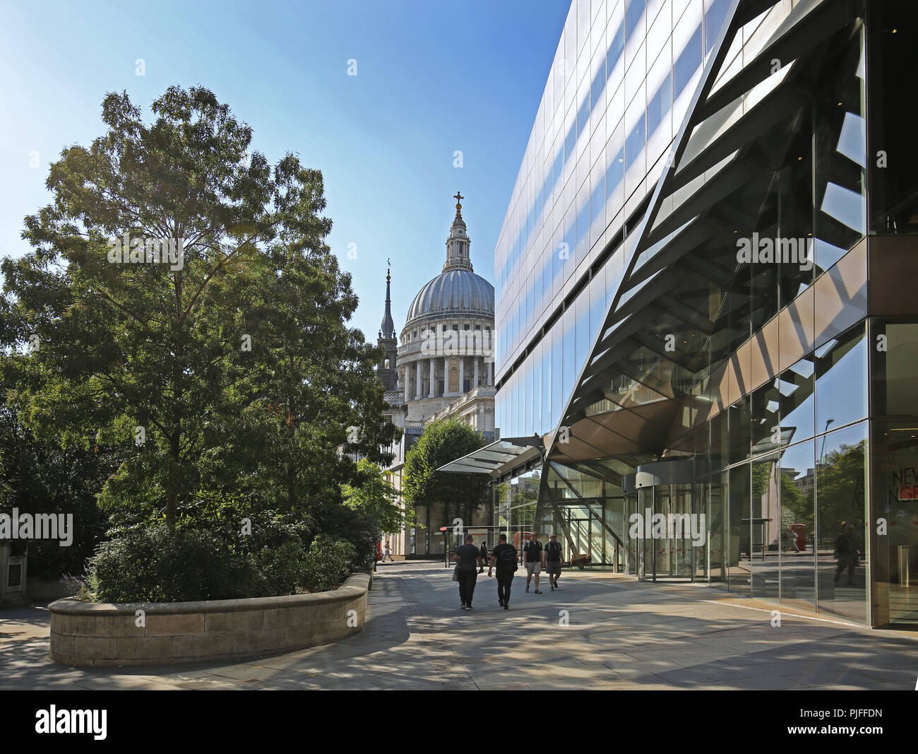 Entrance to the One New Change office development with St Pauls Cathedral beyond - contrasting the old and new. Stock Photo