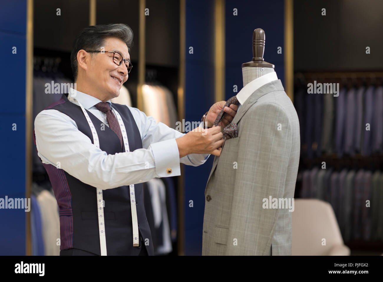Confident fashion designer working Stock Photo - Alamy