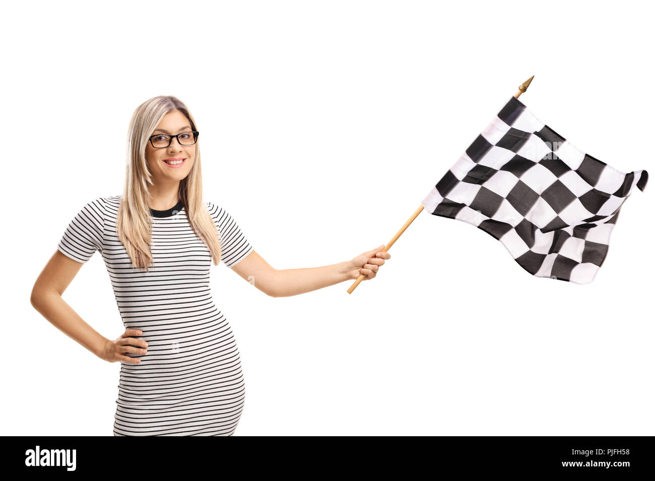 Young woman waving a checkered flag isolated on white background Stock Photo