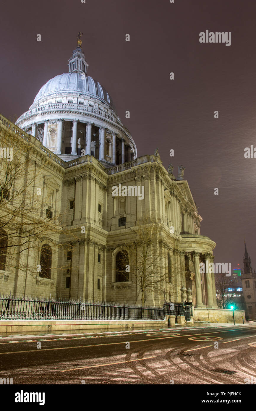 London, England, UK - February 28, 2018: Snow falls on St Paul's Cathedral during the "beast from the east" storm in London. Stock Photo