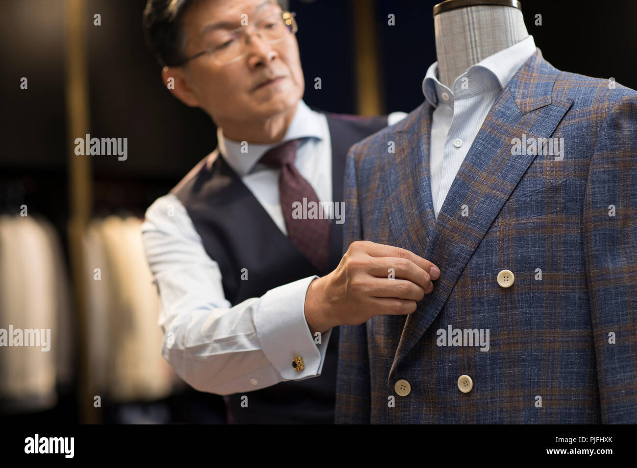 Confident fashion designer working Stock Photo - Alamy