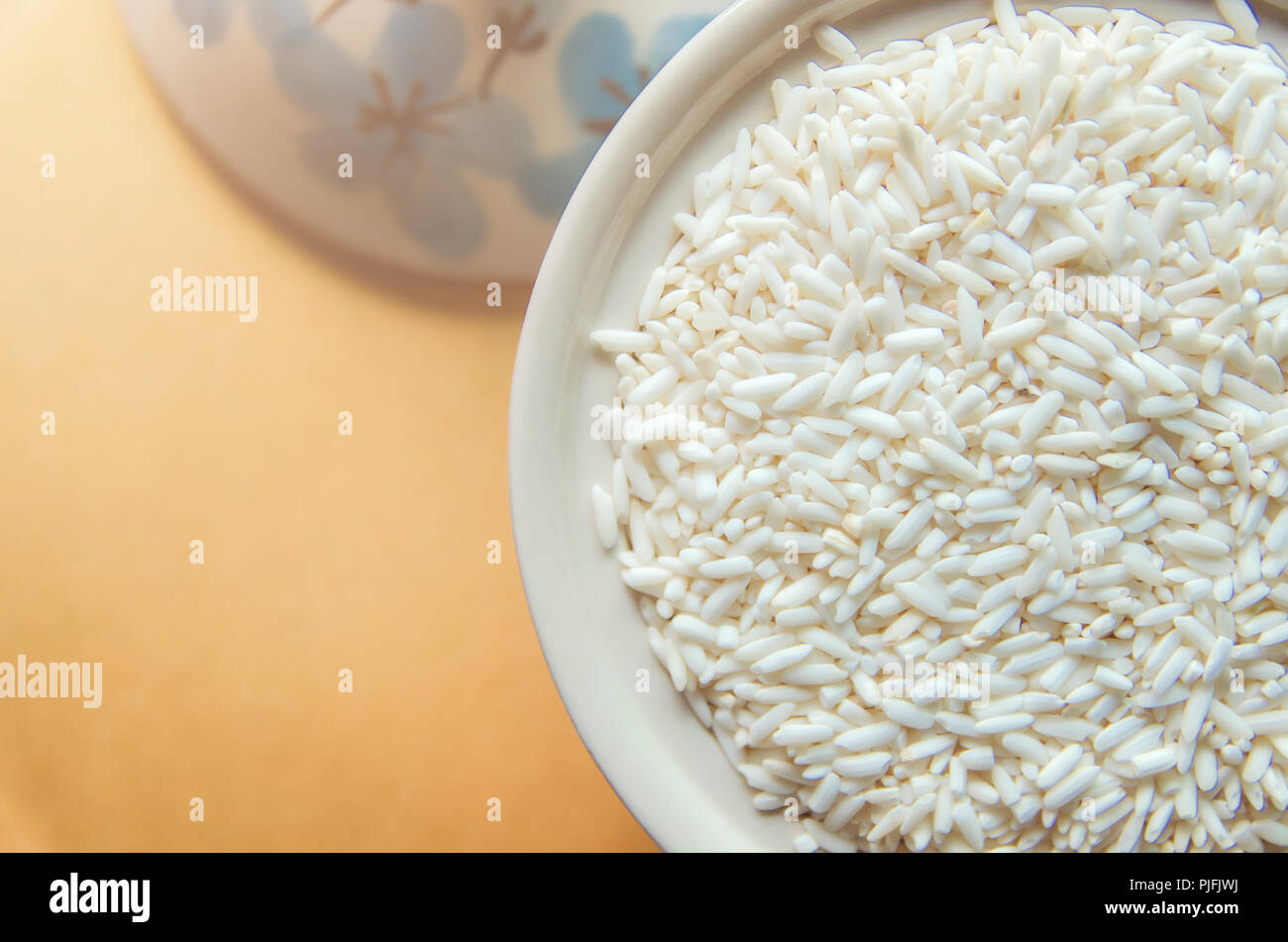 Top view of paddy rice and rice seed on the wooden floor, Background ...