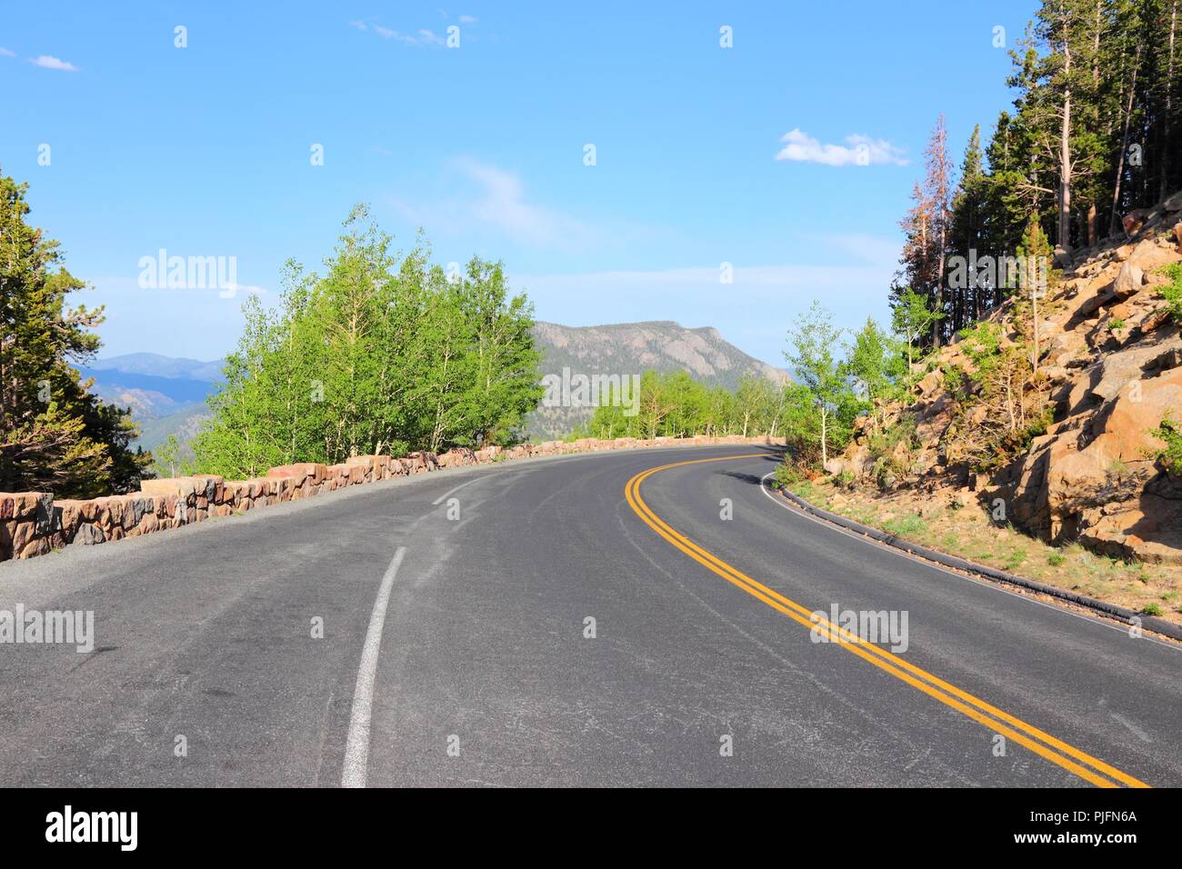 Rocky mountains road forest usa hi-res stock photography and images - Alamy