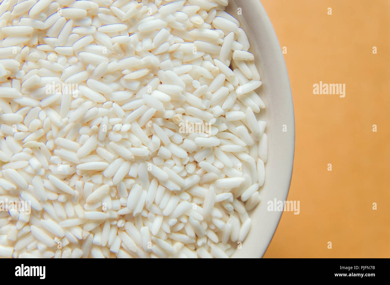 Top view of paddy rice and rice seed on the wooden floor, Background ...