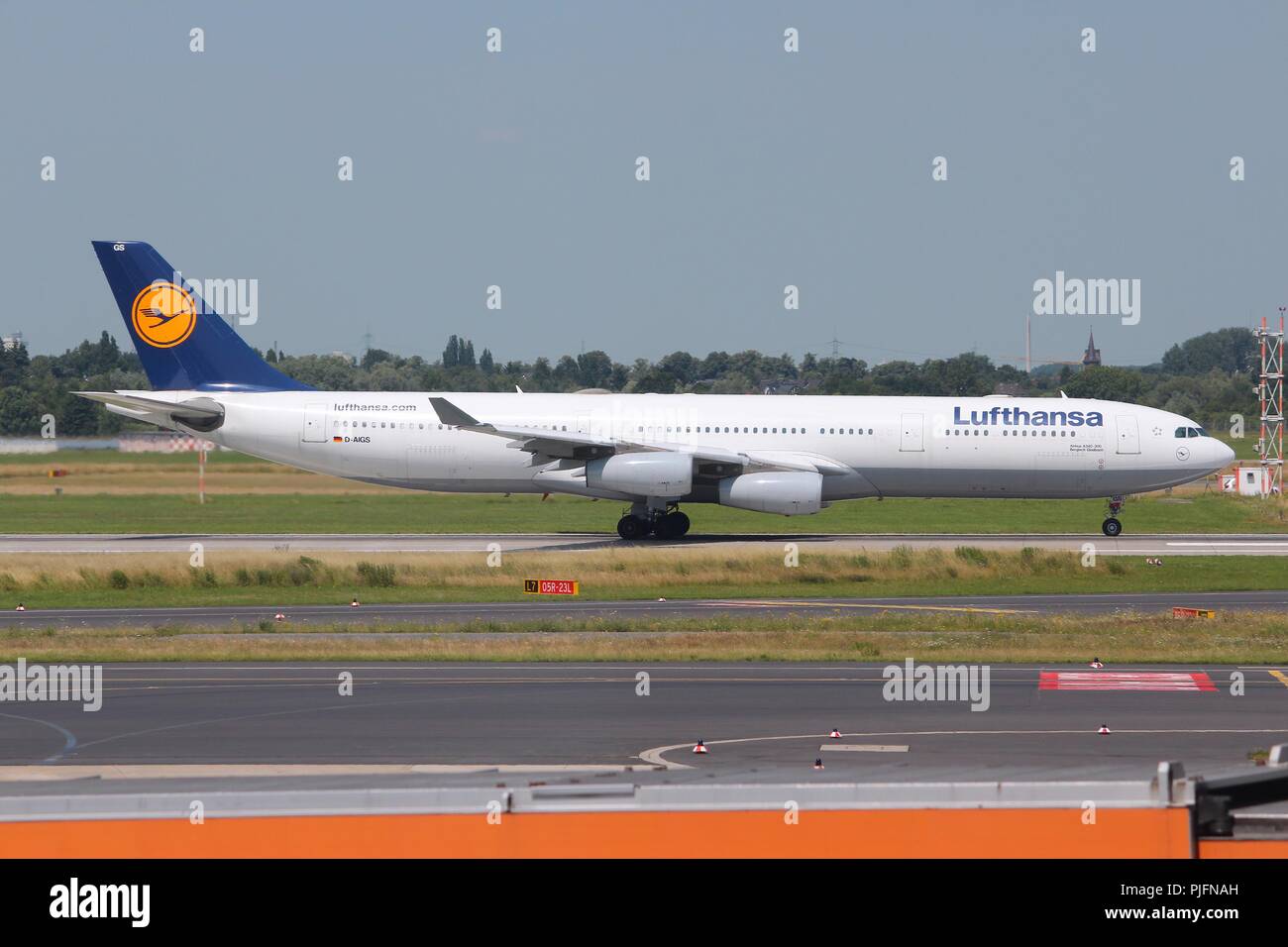 DUSSELDORF, GERMANY - JULY 8, 2013: Lufthansa lands in Dusseldorf Airport, Germany. Lufthansa Group carried over 103 million passengers in 2012. Stock Photo