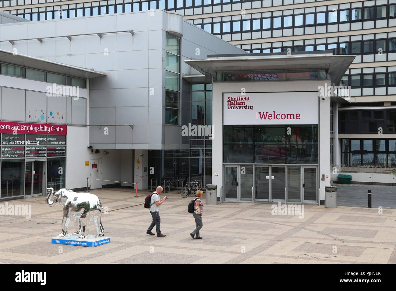 SHEFFIELD, UK - JULY 10, 2016: People visit Sheffield Hallam University in the UK. The public university is 6th largest in the UK with 31,530 students Stock Photo