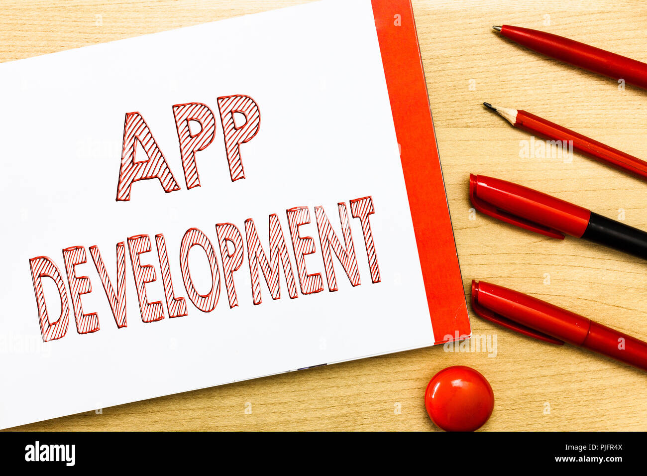 Handwriting text writing App Development. Concept meaning Development services for awesome mobile and web experiences. Stock Photo