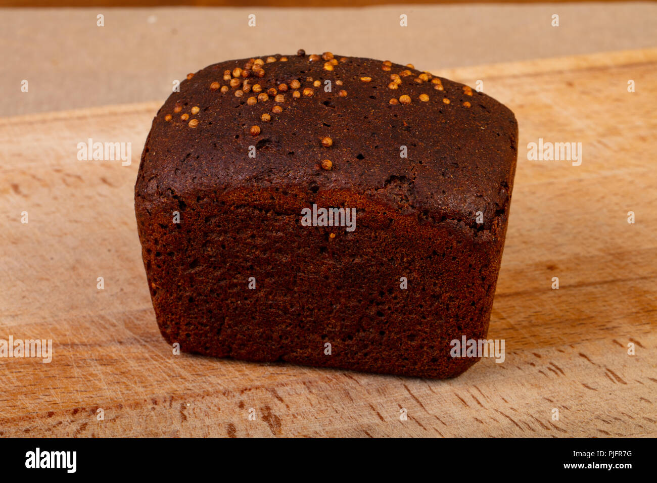 Homemade tasty bread over wooden background Stock Photo - Alamy