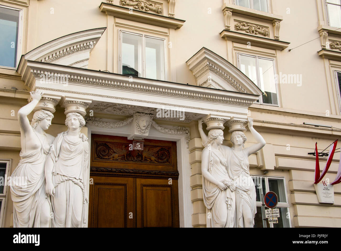 Palais Fries-Pallavicini grand Neoclassical entrance caryatids in Vienna, Austria. Stock Photo