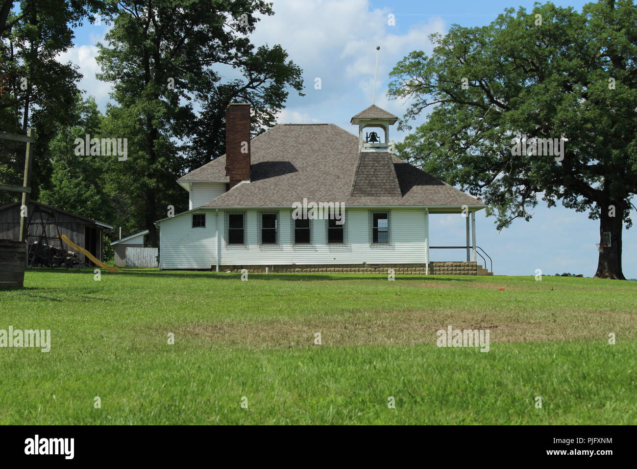 amish school house in a rural setting on a summer day Stock Photo
