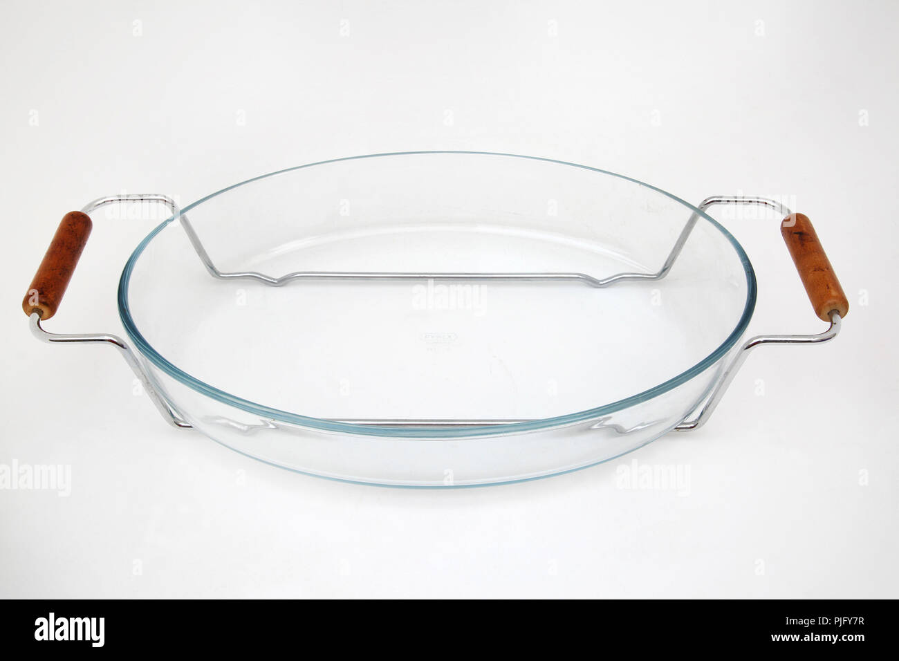 Pyrex Oven Dish with Stainless Steel and Wood Handles Stock Photo